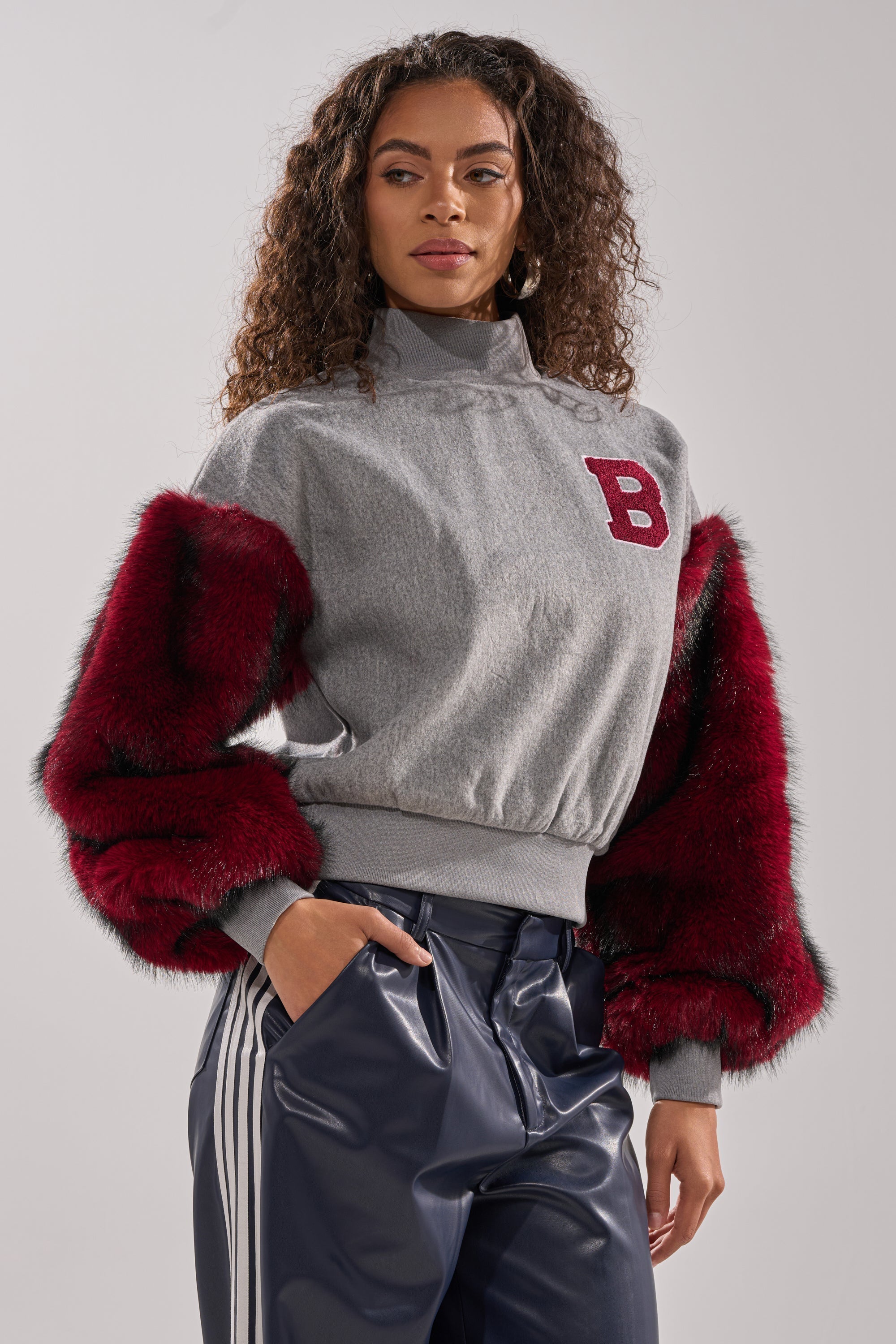 NEW EAST SIDE FAUX FUR SLEEVE SWEATSHIRT